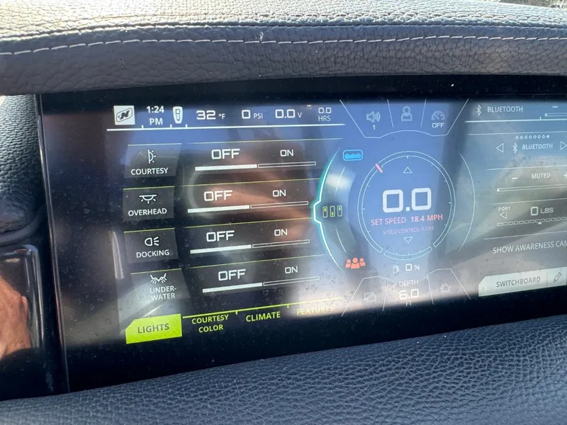 Slide: The Image of Dashboard of 2018 Nautique Super Air Nautique GS24 boat, showing control settings and speedometer. - 29