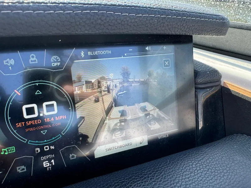 Slide: The Image of Dashboard of 2018 Nautique Super Air Nautique GS24 with speed and depth display. - 34