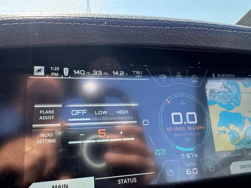 Slide: The Image of Dashboard of 2018 Nautique Super Air Nautique GS24 boat, showing controls and map. - 36