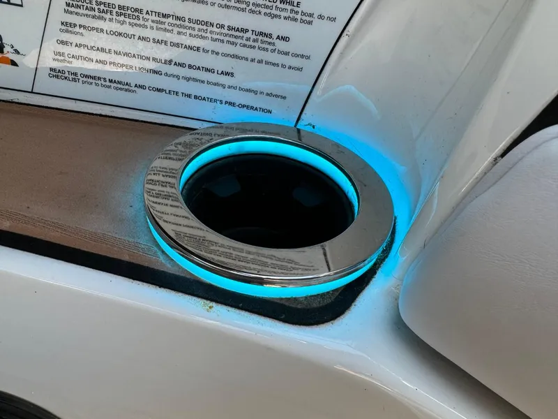 Slide: The Image of Illuminated cup holder on 2018 Nautique Super Air Nautique GS24 boat. - 38