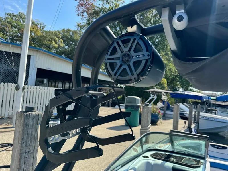 Slide: The Image of 2018 Nautique Super Air Nautique GS24 with JL Audio speaker and wakeboard rack. - 44