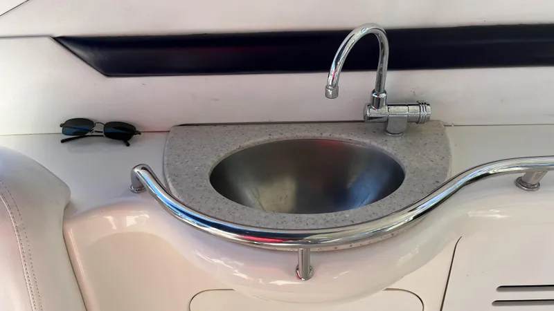 Slide: The Image of Luxury sink on 2008 Sea Ray 380 Sundancer yacht with sleek faucet design. - 15