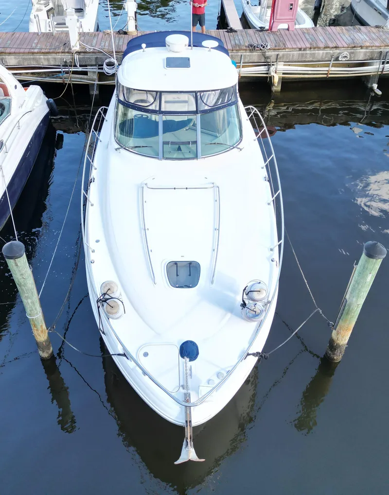 Slide: The Image of 2008 Sea Ray 380 Sundancer docked at marina, aerial view. - 2