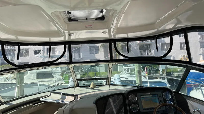 Slide: The Image of Interior view of 2008 Sea Ray 380 Sundancer yacht cockpit with navigation equipment. - 22