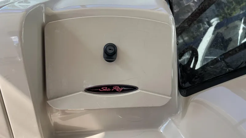 Slide: The Image of Control panel of 2008 Sea Ray 380 Sundancer boat with logo and lock. - 29