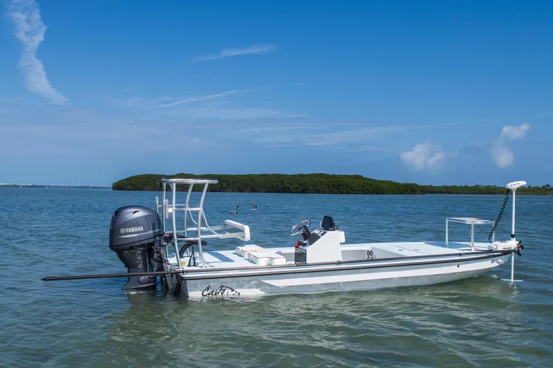 Slide: The Image of 2025 Cayo Boatworks 180 MV in calm waters, featuring a Yamaha outboard motor. - 8