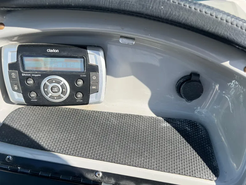 Slide: The Image of Clarion stereo system in 2017 Chaparral 19 H2O Sport boat dashboard. - 8
