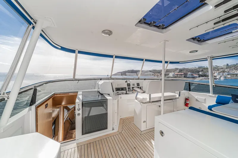 Slide: The Image of Luxurious 1995 Nordlund Cockpit Motor Yacht interior with ocean view and modern amenities. - 18