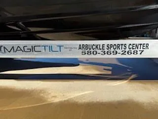 Slide: The Image of 2019 NauticStar 244XTS with Yamaha VMAX outboard engine in a sunny outdoor setting. - 10