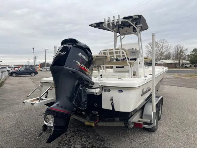 Slide: The Image of 2019 NauticStar 244XTS boat on trailer with Yamaha outboard motor. - 14