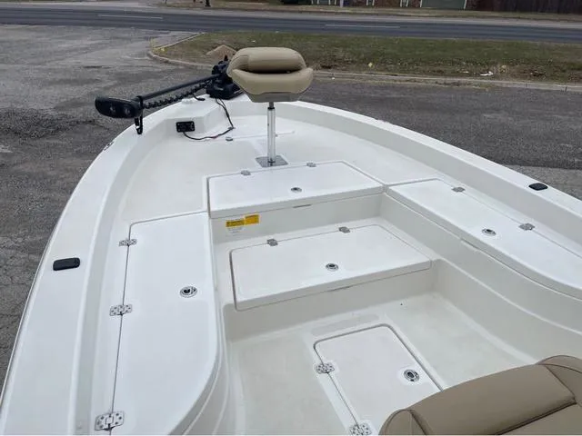 Slide: The Image of 2019 NauticStar 244XTS boat with seating and storage compartments. - 16
