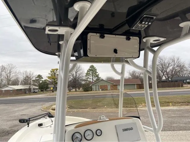Slide: The Image of 2019 NauticStar 244XTS boat console with Simrad electronics and T-top. - 23