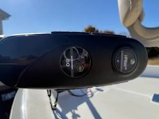 Slide: The Image of 2019 NauticStar 244XTS boat with beige seat and black motor. - 7