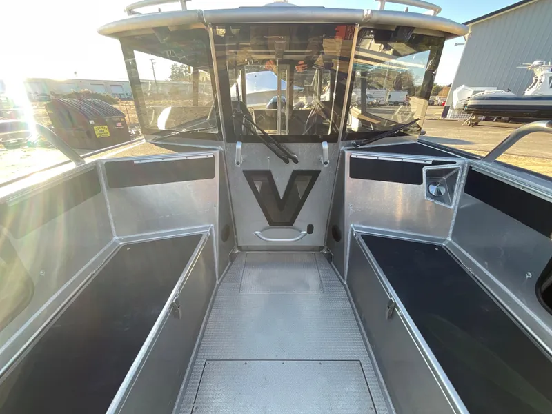 Slide: The Image of 2023 Viggo C8 boat interior with sleek aluminum design and spacious seating. - 22
