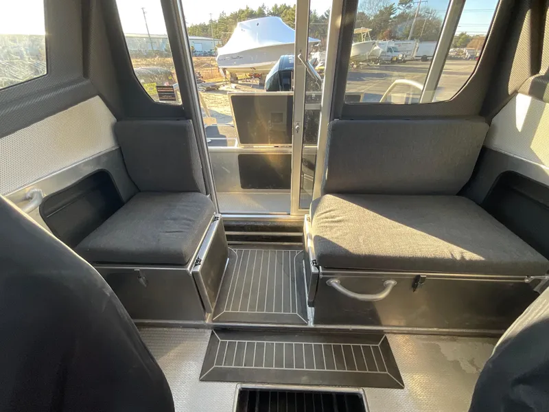 Slide: The Image of Interior of 2023 Viggo C8 boat with seating and storage compartments. - 23