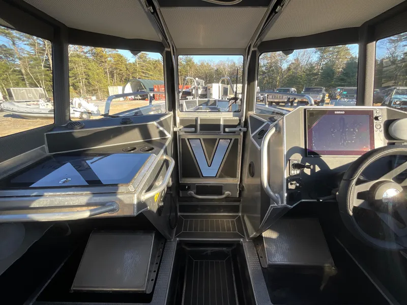 Slide: The Image of Interior of 2023 Viggo C8 boat with modern dashboard and navigation system. - 24