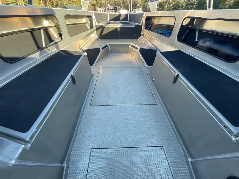 Slide: The Image of 2023 Viggo C8 boat interior with sleek aluminum design and spacious seating. - 28