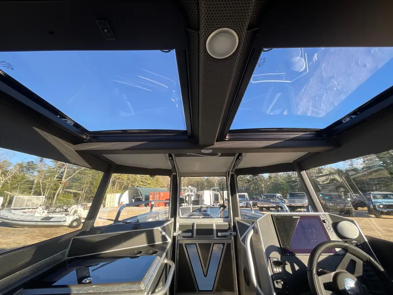 Slide: The Image of Interior view of 2023 Viggo C8 boat with panoramic windows and modern dashboard. - 29