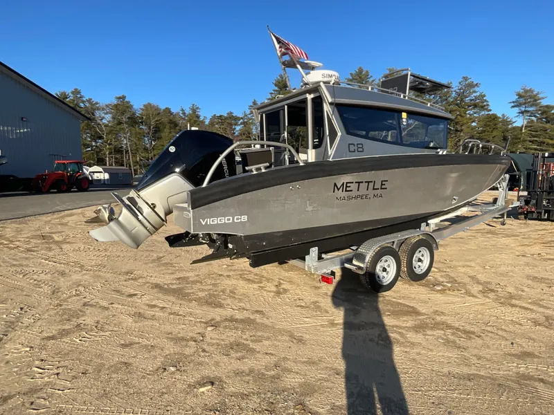 Slide: The Image of 2023 Viggo C8 boat on trailer, outdoor setting, side view. - 9