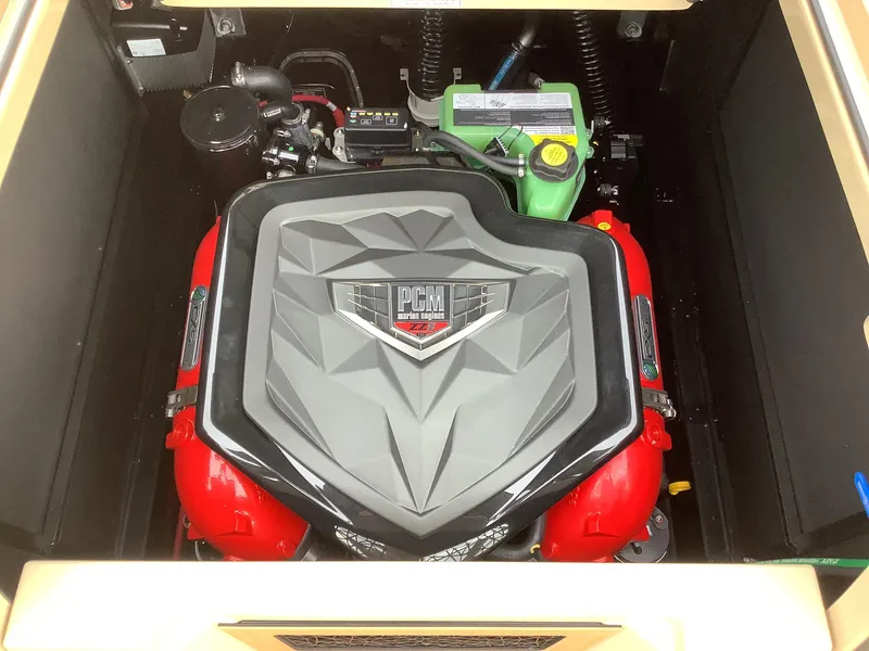 Slide: The Image of 2025 Nautique G23 PCM marine engine with red accents and geometric cover design. - 20
