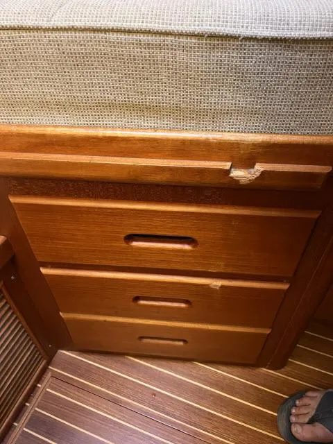 Slide: The Image of Wooden drawers on 1999 Grand Banks Eastbay 38 boat interior. - 20