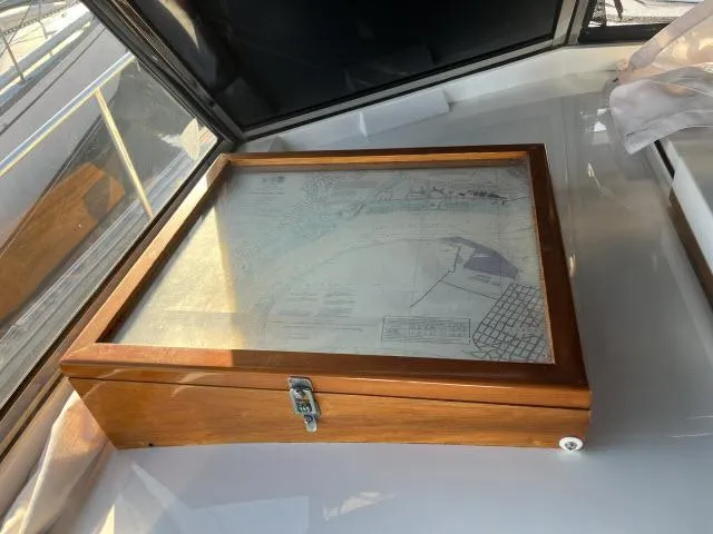 Slide: The Image of Wooden navigation chart box on 1999 Grand Banks Eastbay 38 yacht. - 42