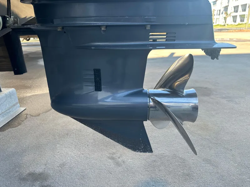 Slide: The Image of Close-up of a 2022 NauticStar Legacy 2302 boat propeller. - 18