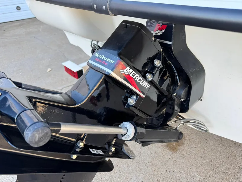 Slide: The Image of Close-up of a 2002 Bayliner 185 BR boat's MerCruiser engine component. - 11