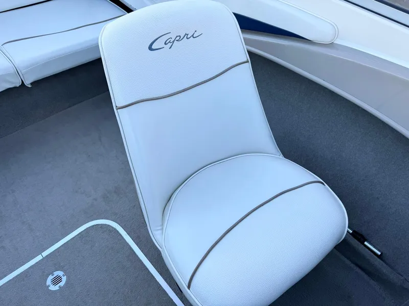 Slide: The Image of White seat in 2002 Bayliner 185 BR boat interior. - 21