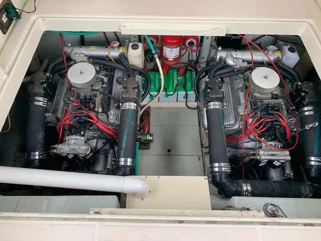 Slide: The Image of Twin engines in a 1968 Chris-Craft 31 Commander boat engine compartment. - 19