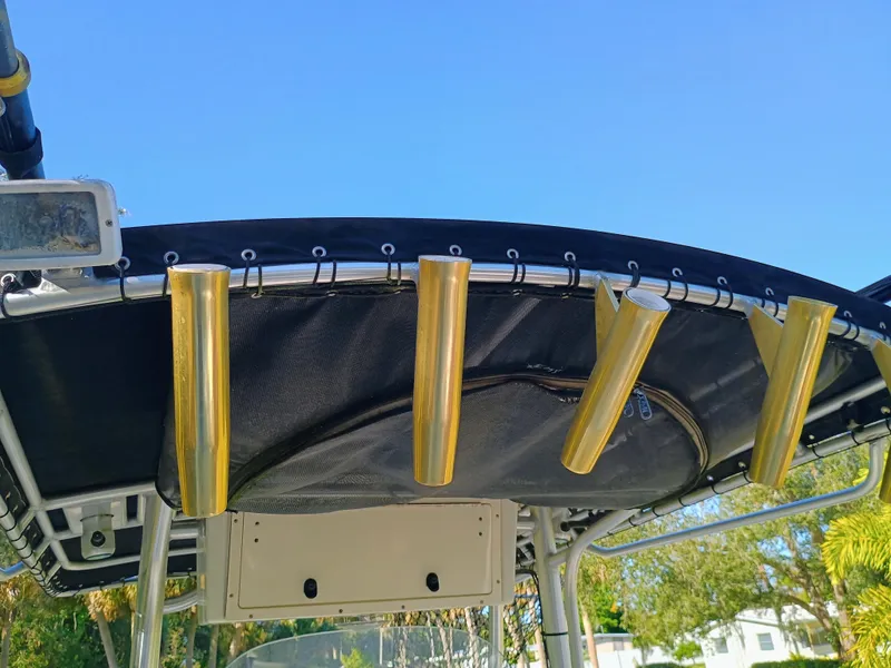 Slide: The Image of 2007 Hydra-Sports 2500CC Vector boat with gold rod holders and canopy. - 18