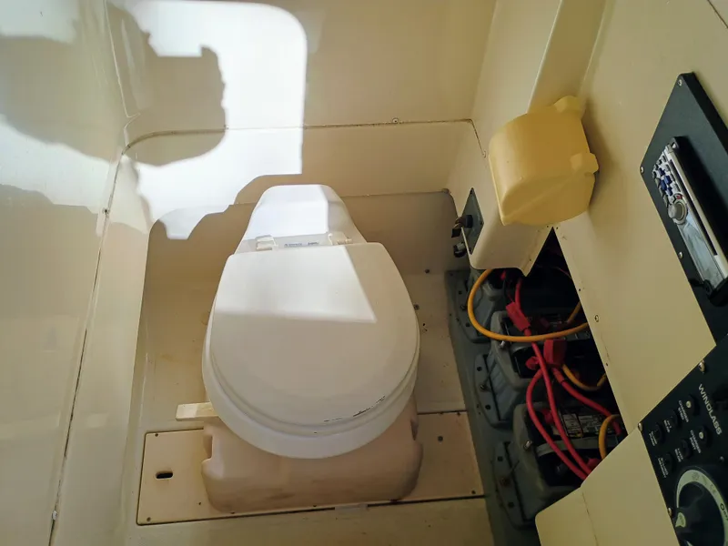 Slide: The Image of 2007 Hydra-Sports 2500CC Vector boat interior with toilet and electrical panel. - 22