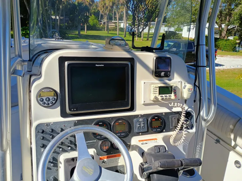 Slide: The Image of 2007 Hydra-Sports 2500CC Vector boat dashboard with navigation equipment and steering wheel. - 5