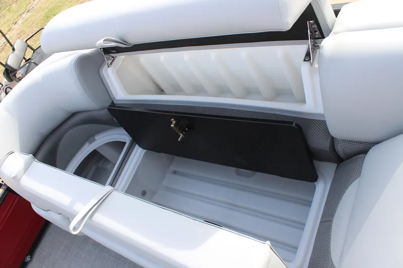 Slide: The Image of 2025 Regency 230 DL3 pontoon boat interior with luxurious gray seating. - 18