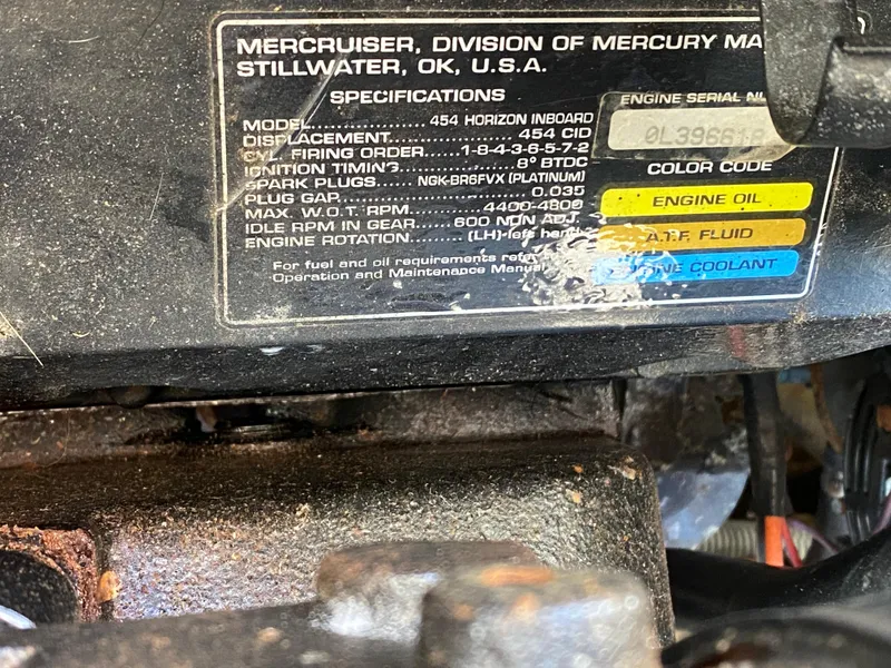 Slide: The Image of Engine specifications label for MerCruiser 454 Horizon Inboard, showing firing order and fluid types. - 33