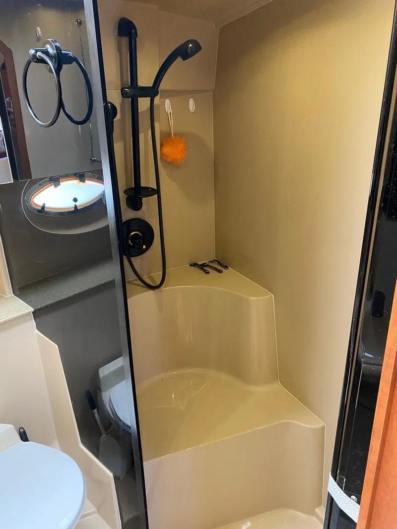 Slide: The Image of Bathroom interior of 2000 Cruisers 3672 yacht with shower and toilet. - 28