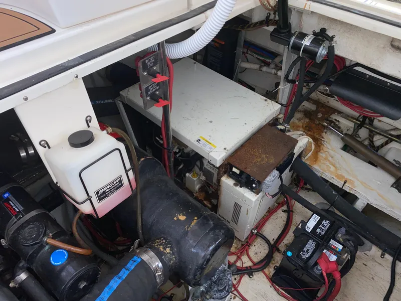 Slide: The Image of Engine compartment of 2000 Cruisers 3672 with visible wiring and components. - 30