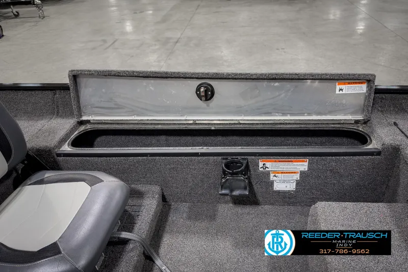 Slide: The Image of 2021 Lowe Skorpion 17 boat interior with storage compartment and seating. - 18