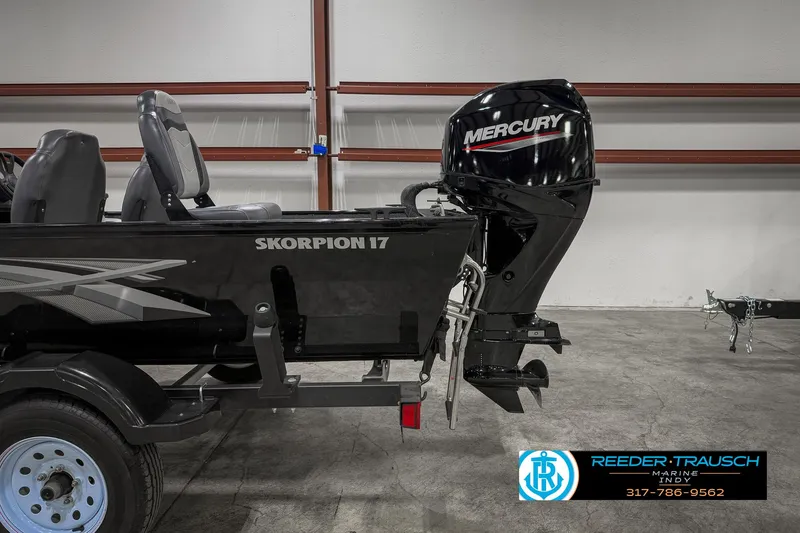 Slide: The Image of 2021 Lowe Skorpion 17 boat with Mercury outboard motor in showroom. - 35
