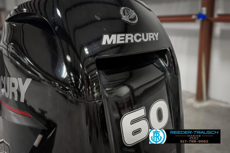 Slide: The Image of 2021 Lowe Skorpion 17 with Mercury 60 outboard motor in showroom. - 37