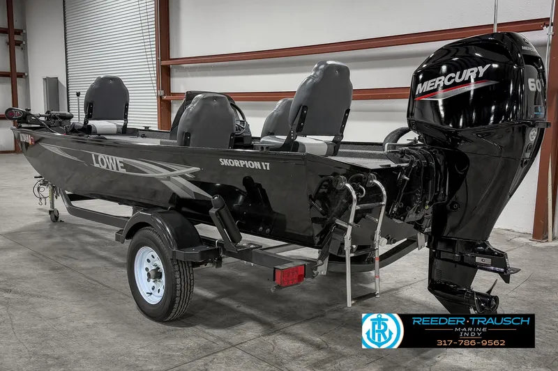 Slide: The Image of 2021 Lowe Skorpion 17 boat with Mercury 60 engine in a warehouse setting. - 4