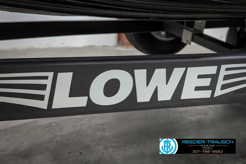 Slide: The Image of Lowe Skorpion 17 boat trailer, 2021 model, featuring bold branding and sturdy construction. - 41