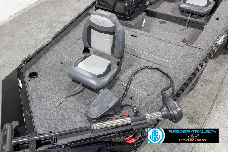 Slide: The Image of 2021 Lowe Skorpion 17 fishing boat interior with seating and trolling motor. - 7
