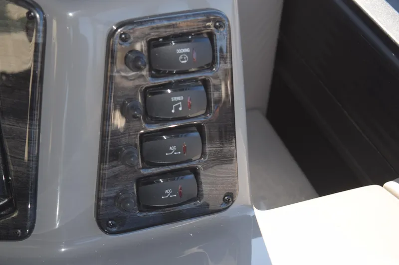 Slide: The Image of Control panel of 2025 Qwest E-Class 824 RLS with multiple switches. - 15