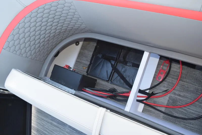 Slide: The Image of 2025 Qwest E-Class 824 RLS boat interior wiring and battery compartment. - 26