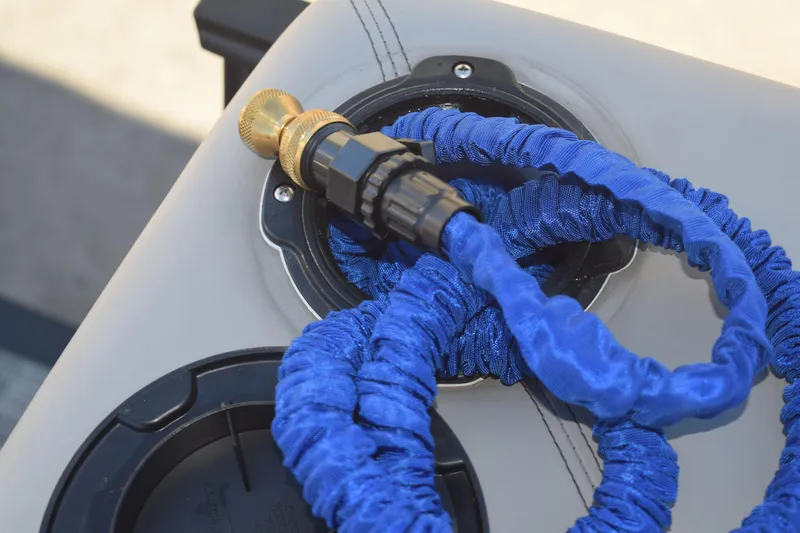 Slide: The Image of Blue hose connected to Qwest E-Class 824 RLS, 2025 model. - 28