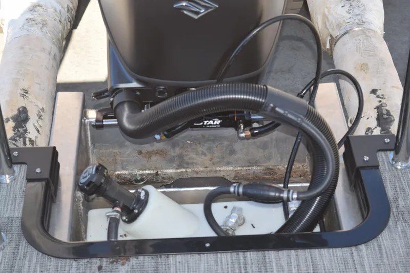 Slide: The Image of Boat engine compartment of 2025 Qwest E-Class 824 RLS with visible wiring and components. - 34