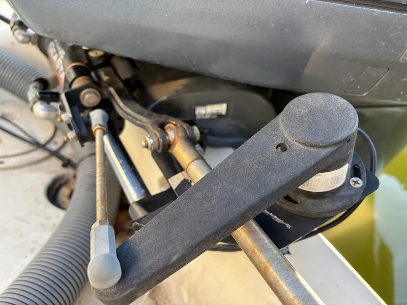 Slide: The Image of Close-up of 2003 Pursuit 2670 Denali LS boat engine components. - 13