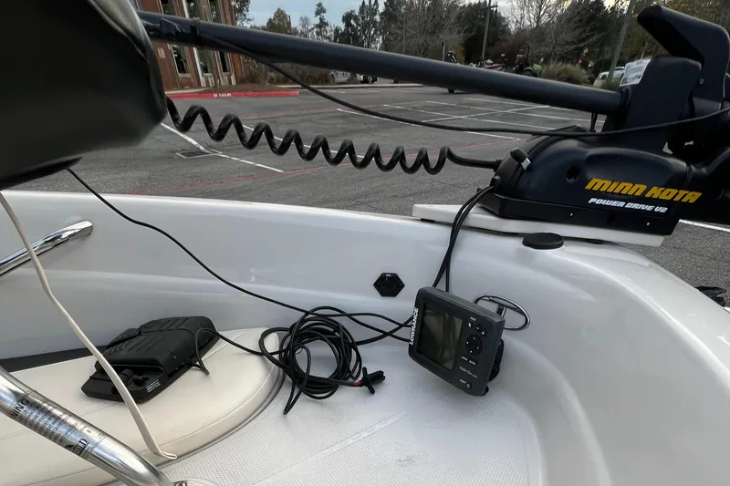 Slide: The Image of 2013 Tahoe Q5i boat with Minn Kota trolling motor and fish finder. - 9
