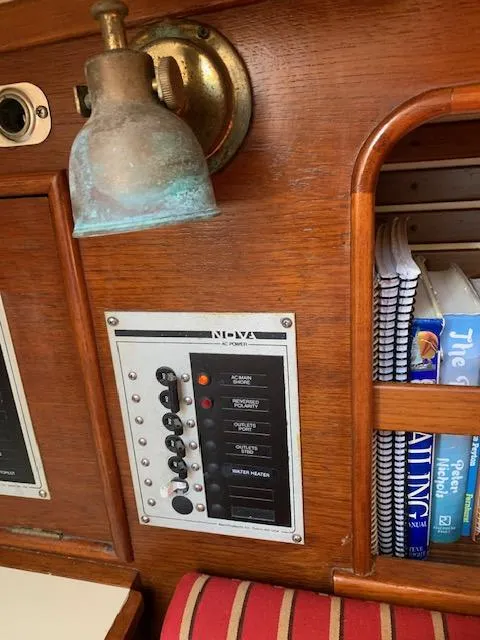 Slide: The Image of Control panel and light fixture on 1986 Nonsuch 30 Ultra sailboat interior. - 30